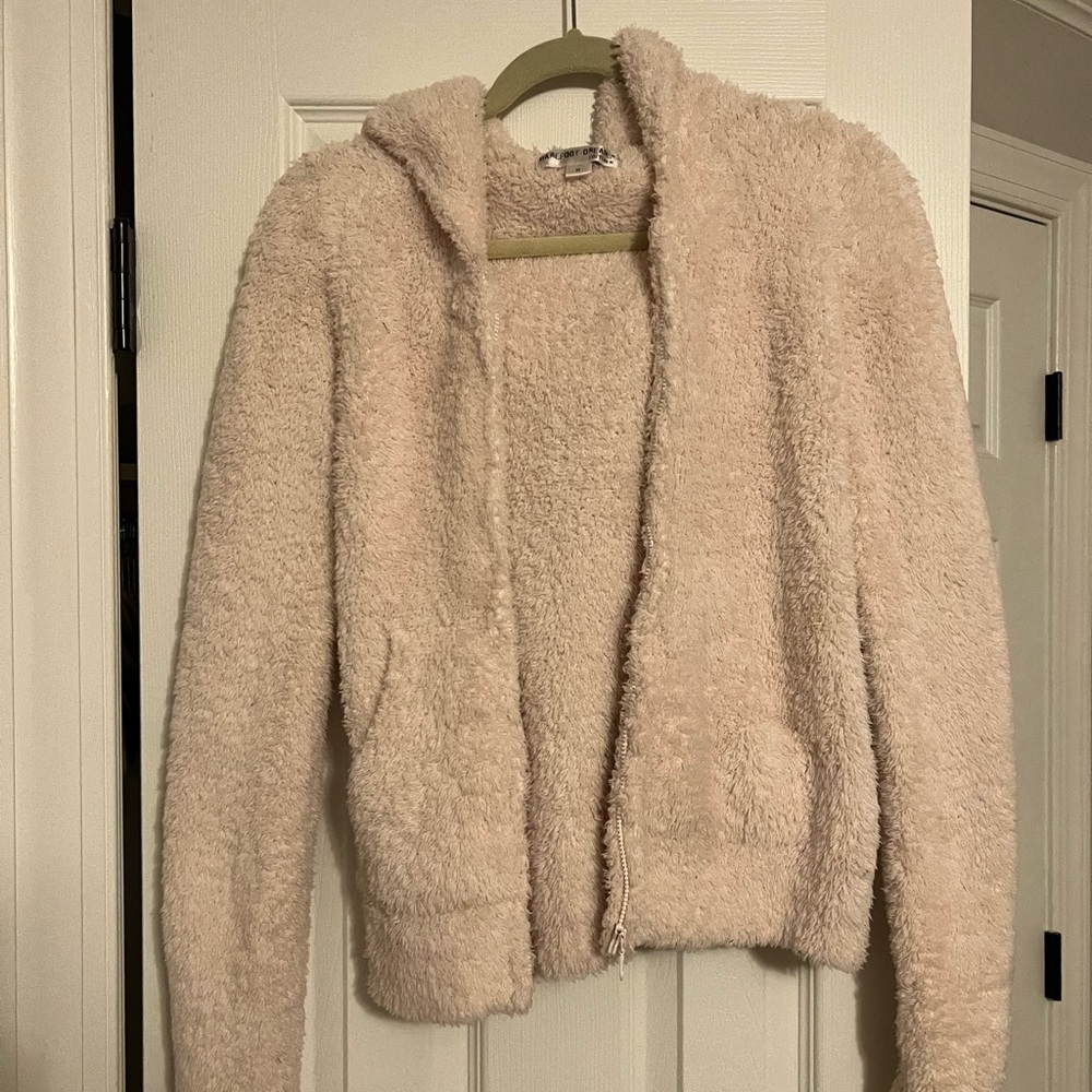 Light pink ultra cozy Barefoot Dreams zip up hoodie.